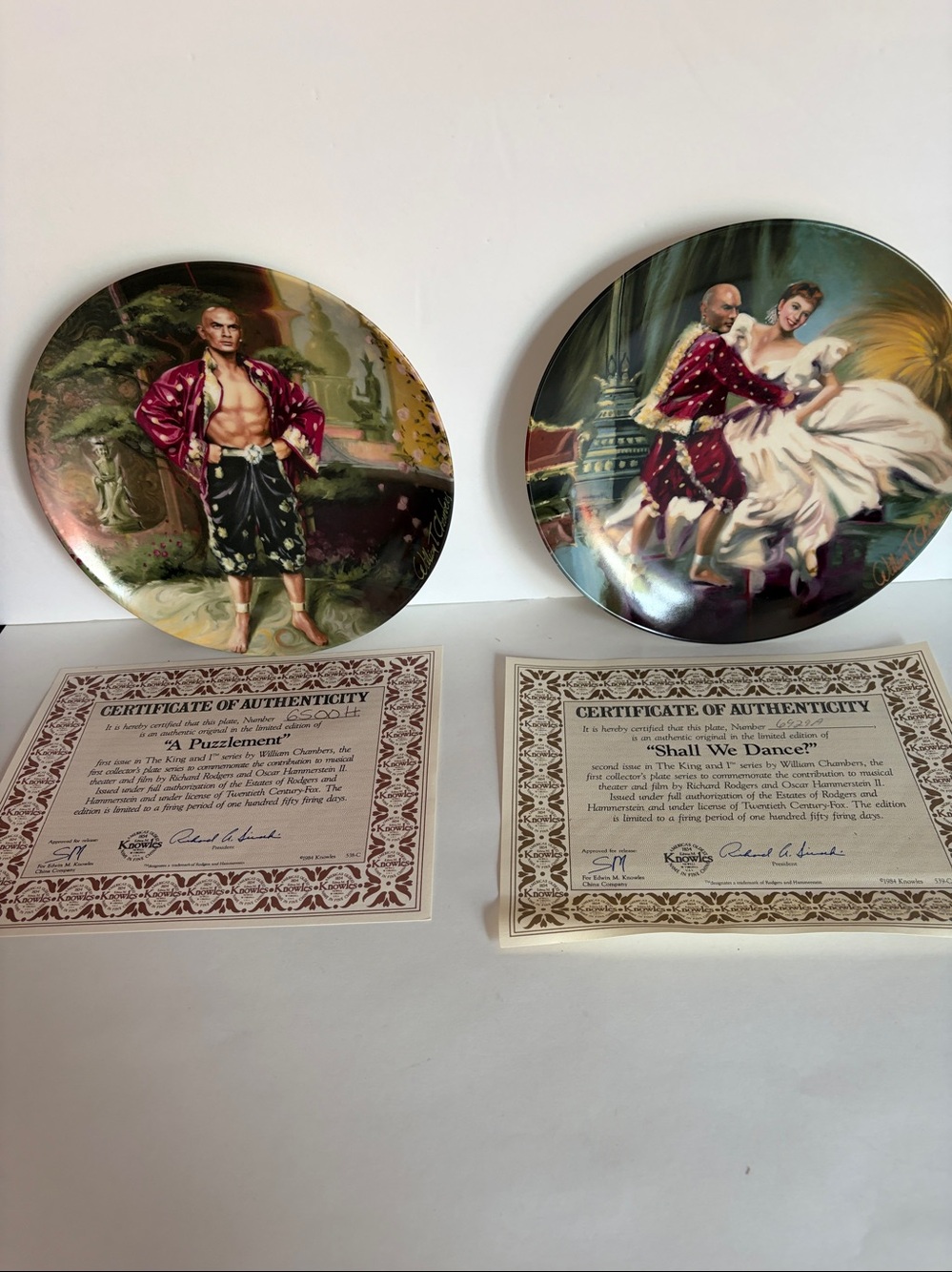 The King & I decorated plates with certificates.